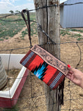 Orange Aztec hand strap bag