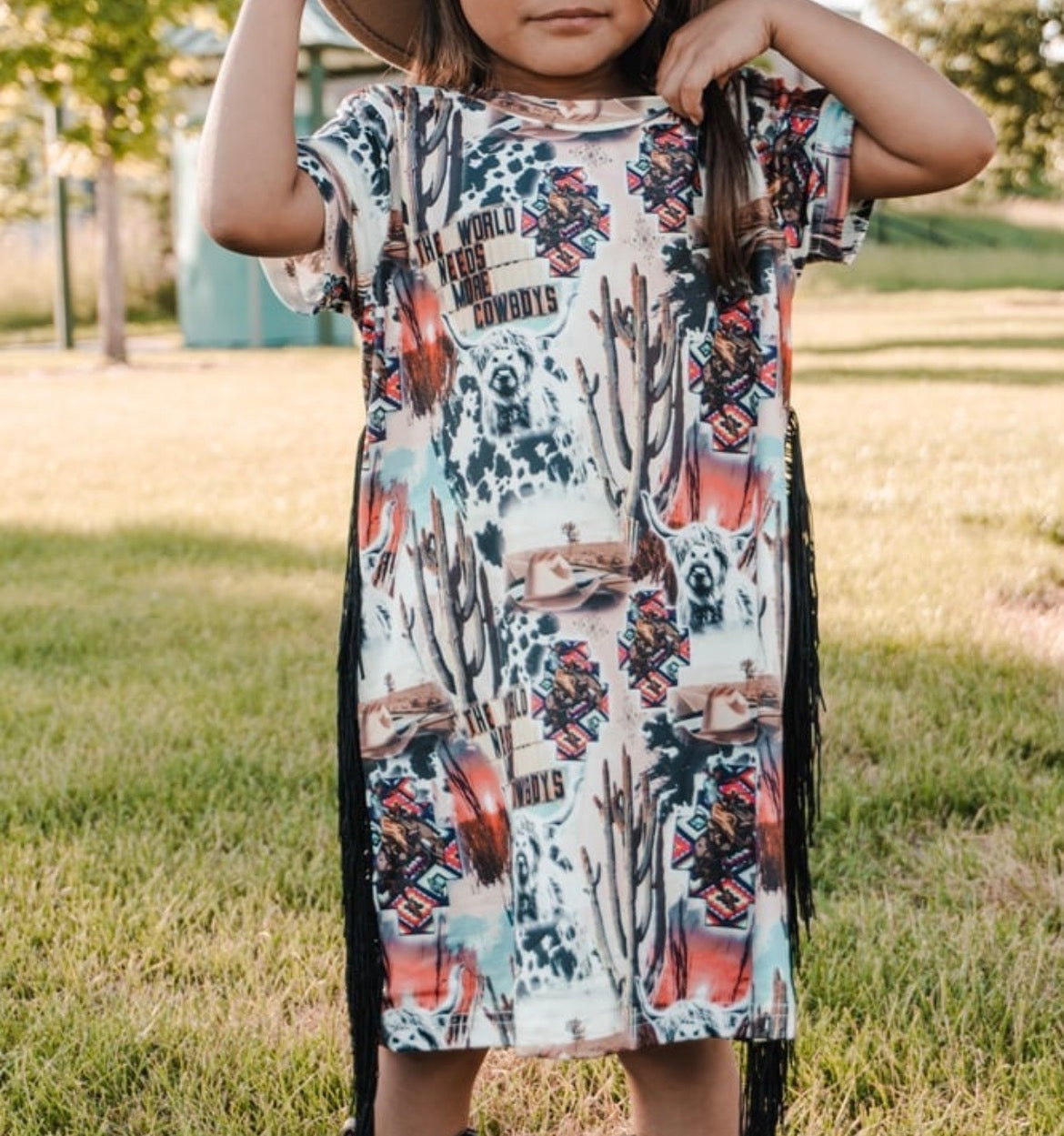 The world needs more cowboys fringe dress